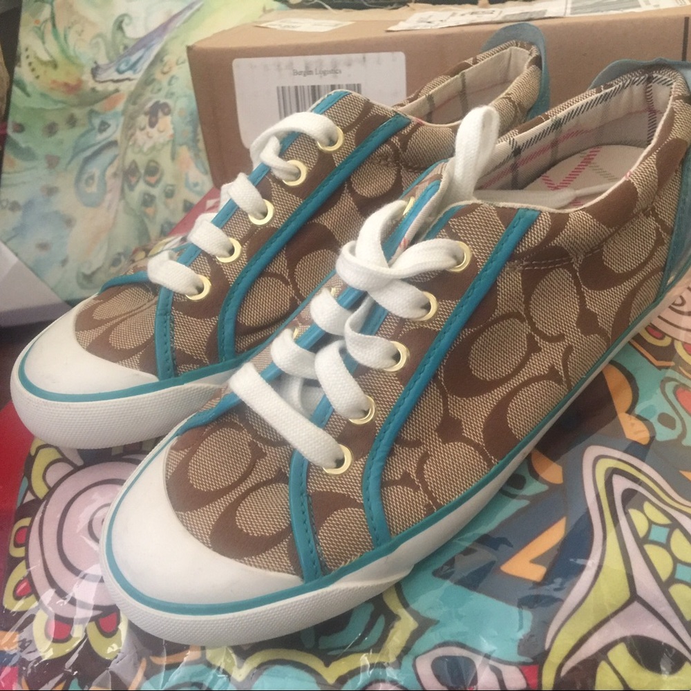 Excellent condition "re-posh" size 7 Coach kicks