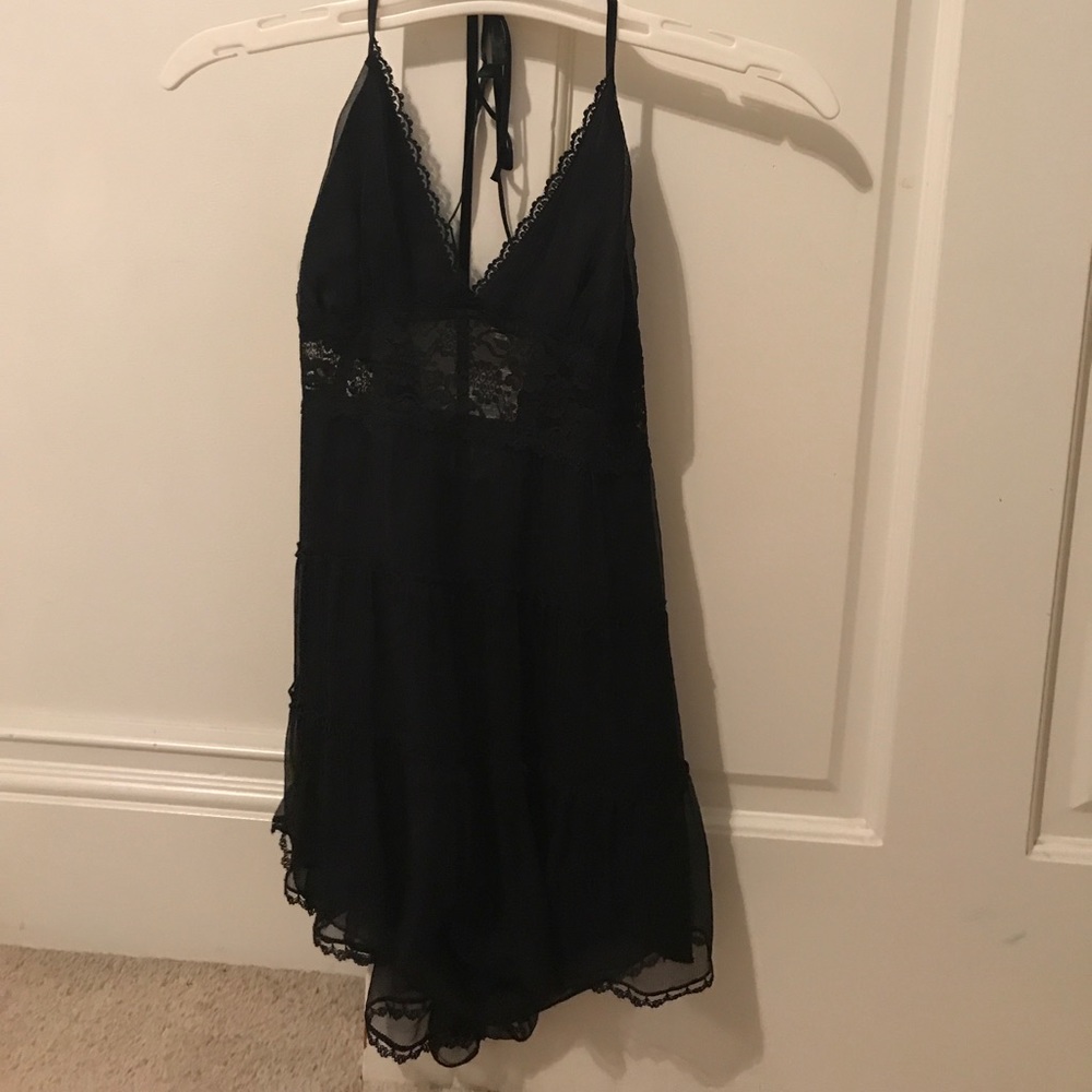 Bebe black halter lace top! Semi see through!