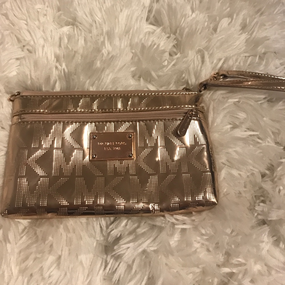 Rose gold Michael Kors wristlet