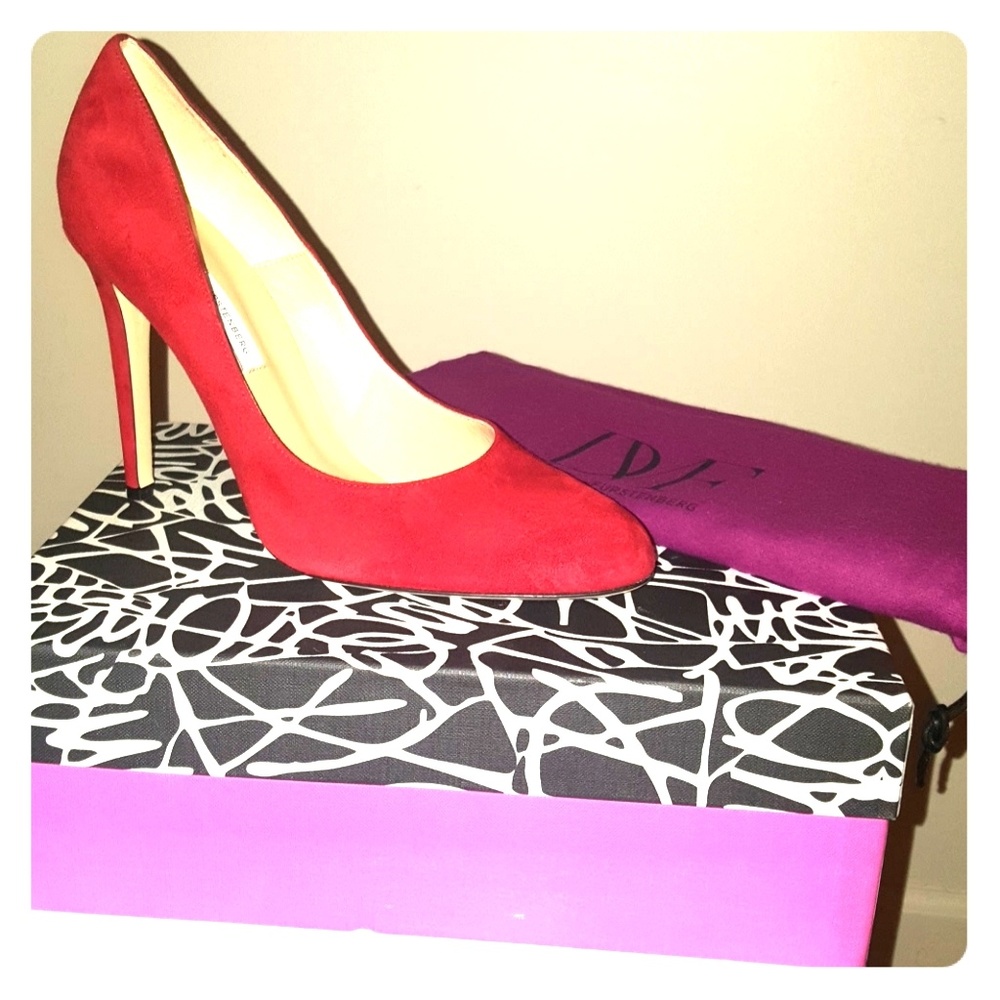 Red suede pumps