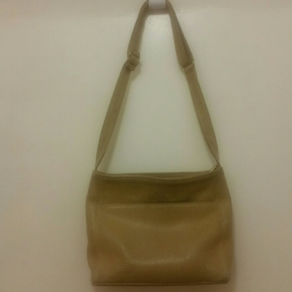 Coach's collection of Sonoma Natural Grain Leather