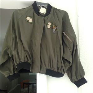 Olive bomber jacket with embroidered patches