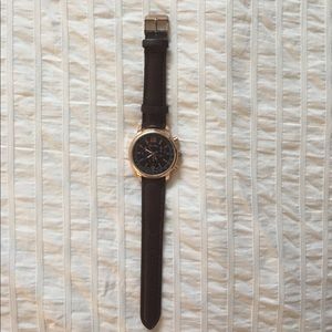 Rose gold and brown watch