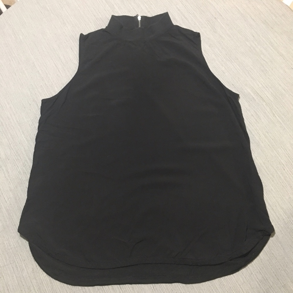 Black sleeveless mock turtleneck blouse
