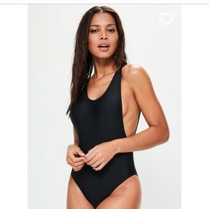 Black one piece, size 6, NWT