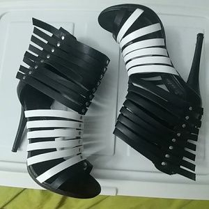 Black and white caged winged sandals