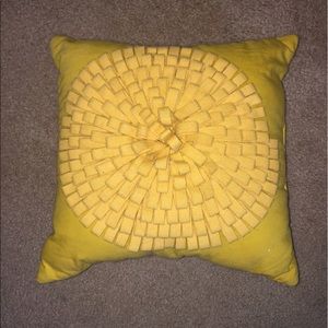 Yellow/gold throw pillow