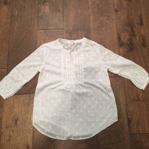 A white blouse that is perfect for summer
