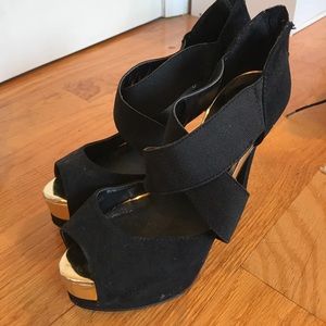 Black and gold heels
