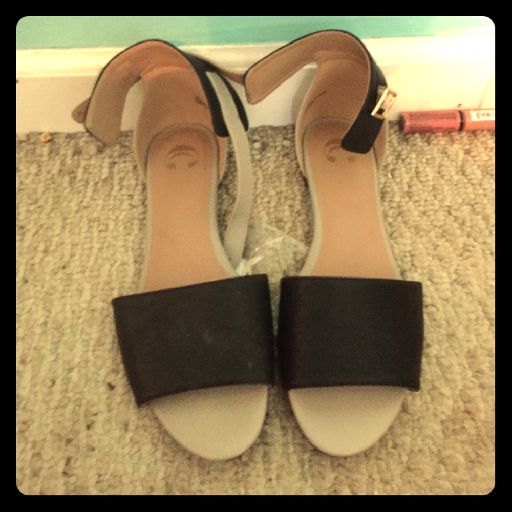Grey and black sandals