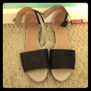 Grey and black sandals