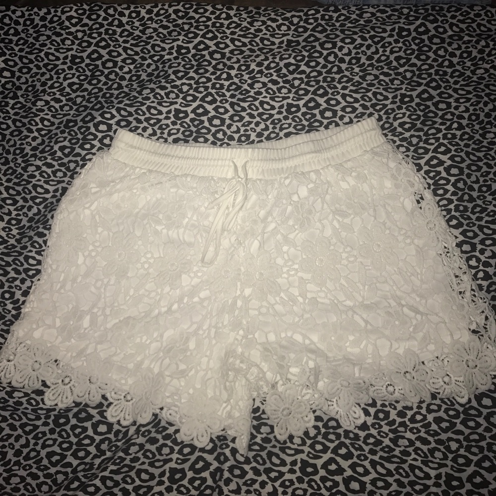 White surfer shorts