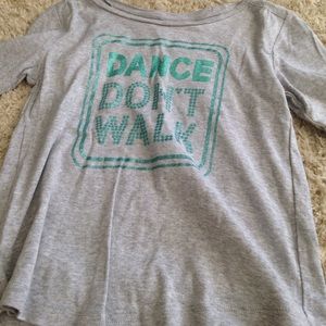 A shirt for kids who like to dance.