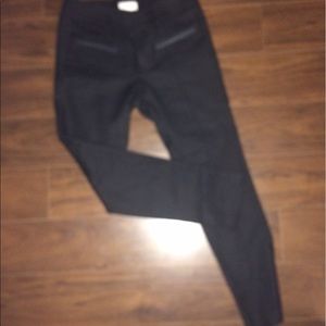 Helmut Lang Black ankle slack with pocket trim.