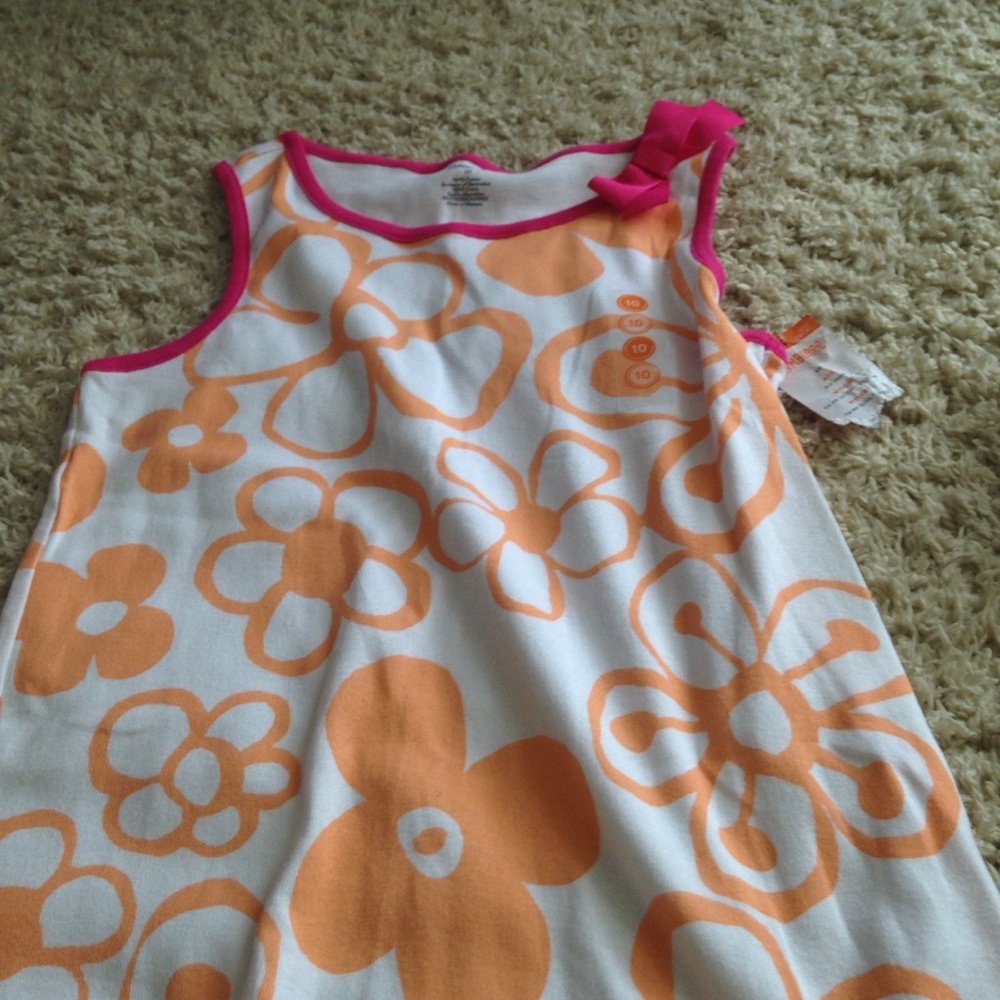 A flower tank top and a matching pair if shorts.
