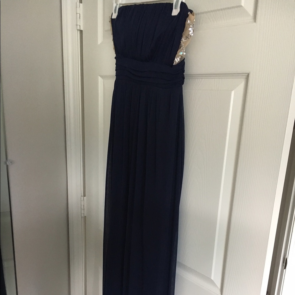 Navy formal dress with embellishments on the side