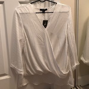 Cute black polka doted top!