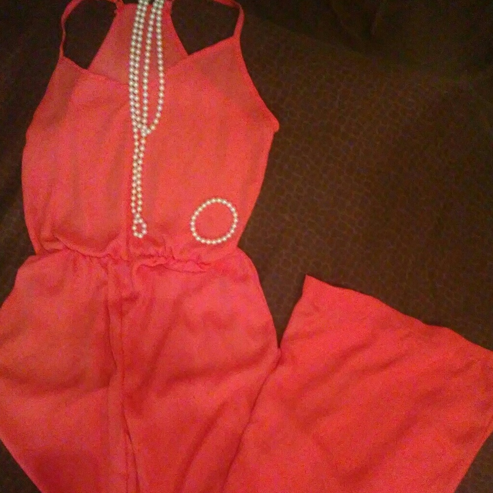 Coral colored pants romper