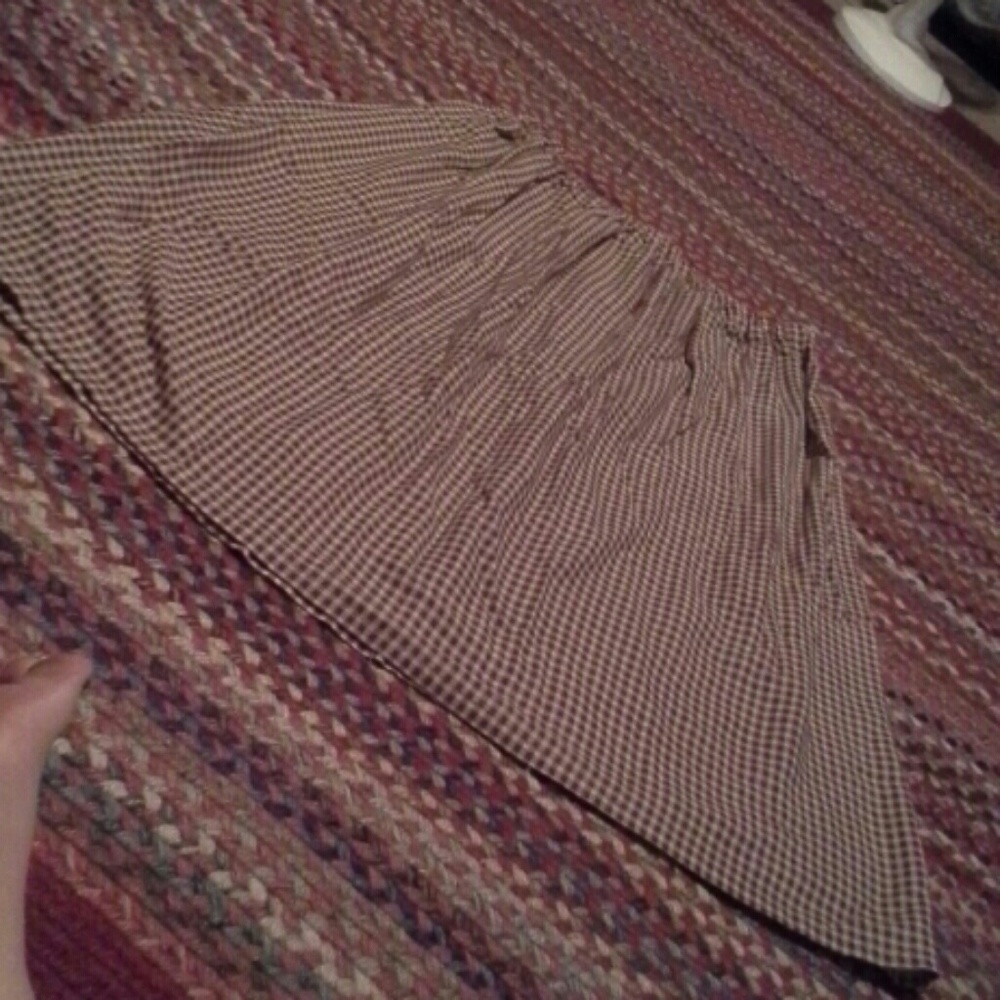 Red and white checked skirt.