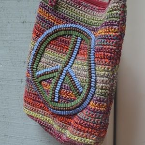 The Sak multicolored cross body peace sign bag