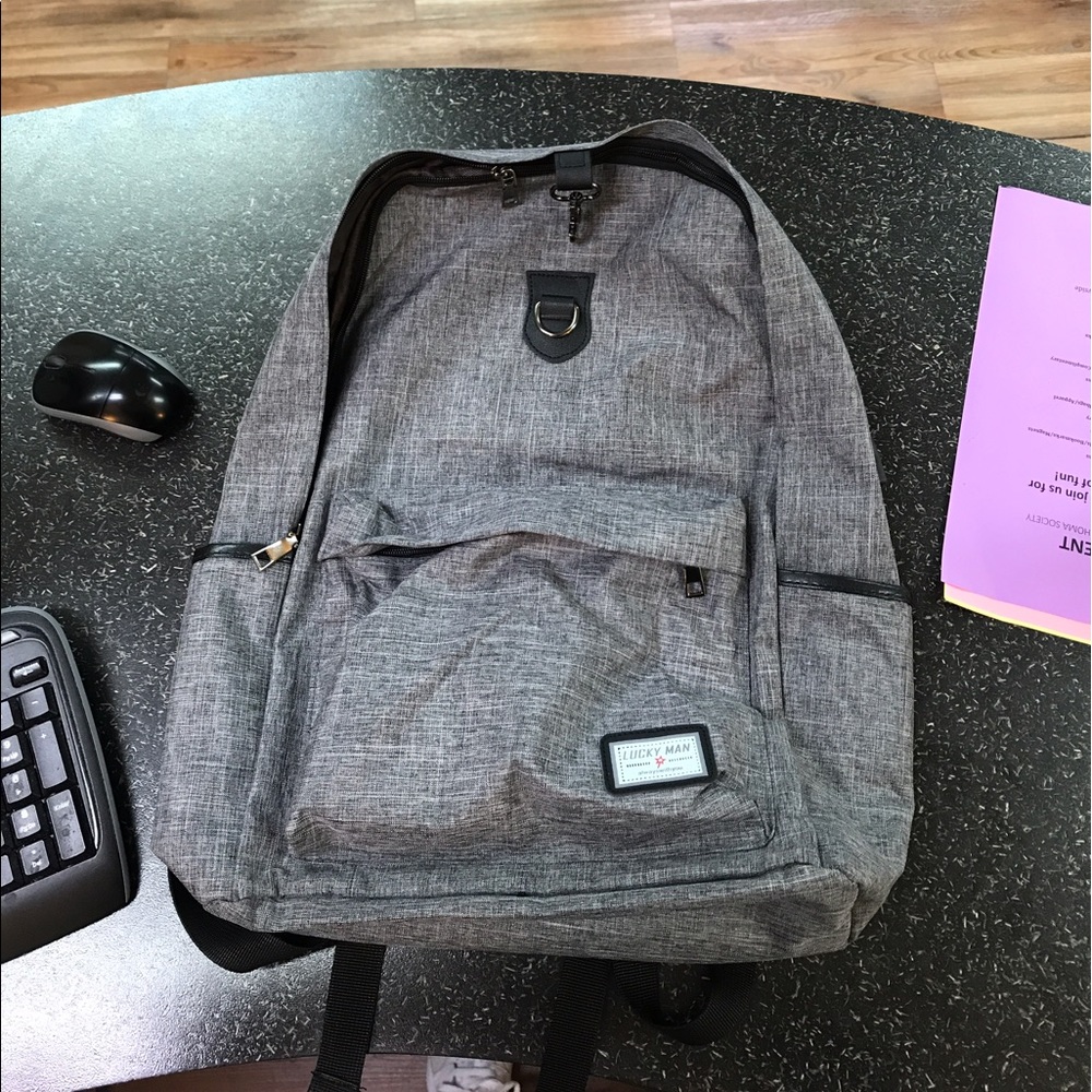 Lucky Man book bag with portable charger brand new