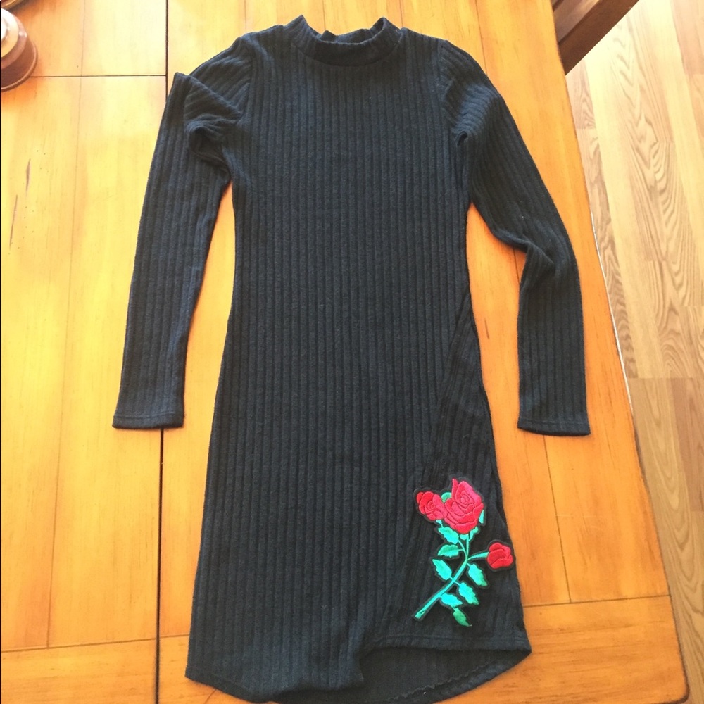 Black sweater dress with roses