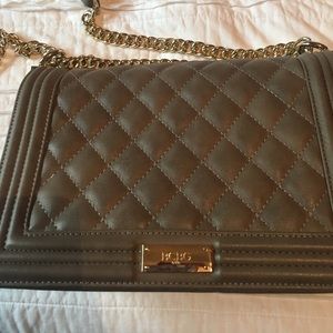 BCBG Gold shoulder bag with quilted detail/ chain