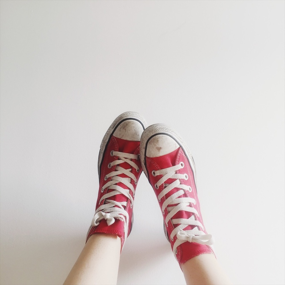 Cherry red converse high tops