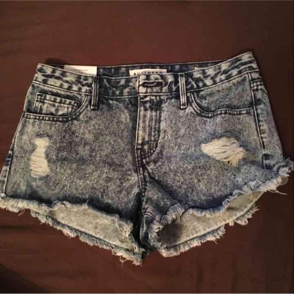 Distressed denim shorts