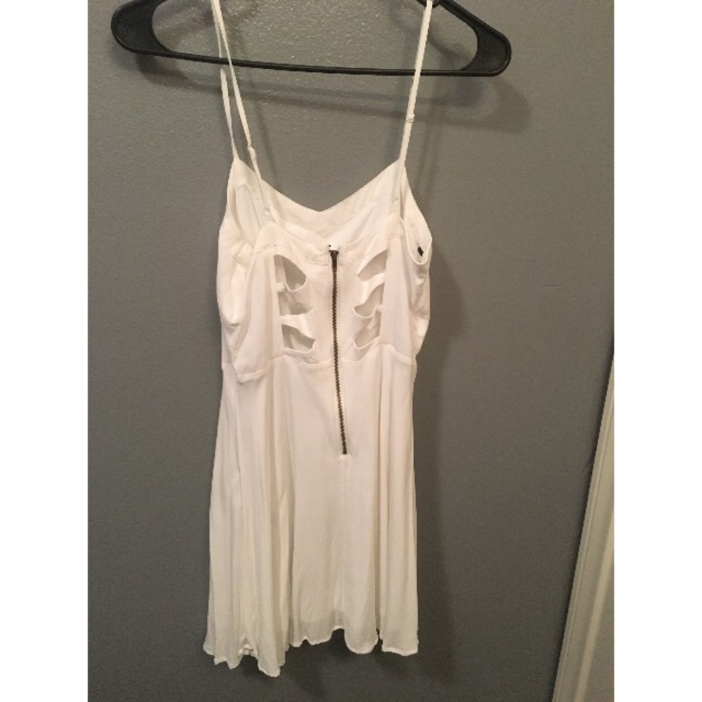 White dress with cutouts