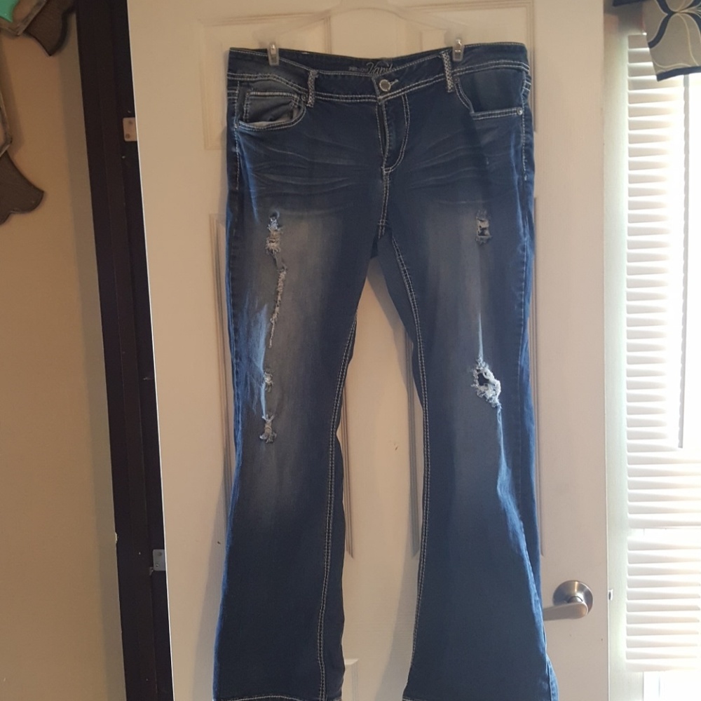 Distressed vanity jeans