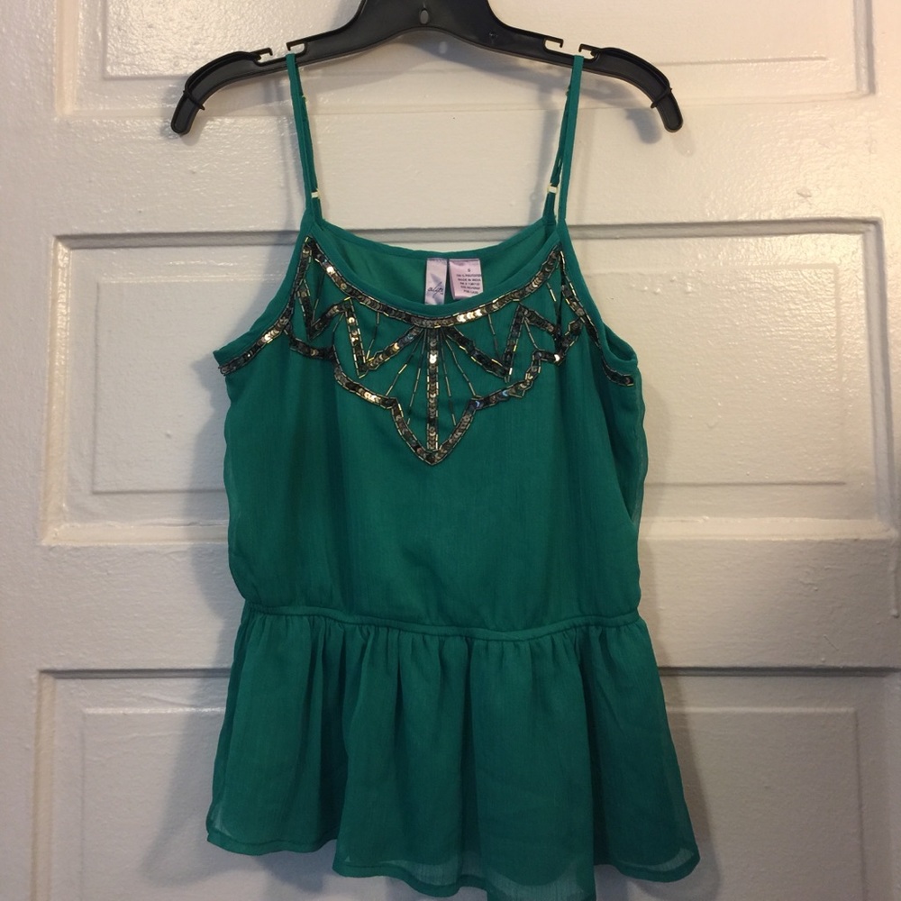 Green beaded peplum top
