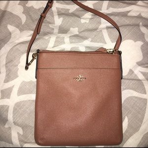 Brown cross body coach purse