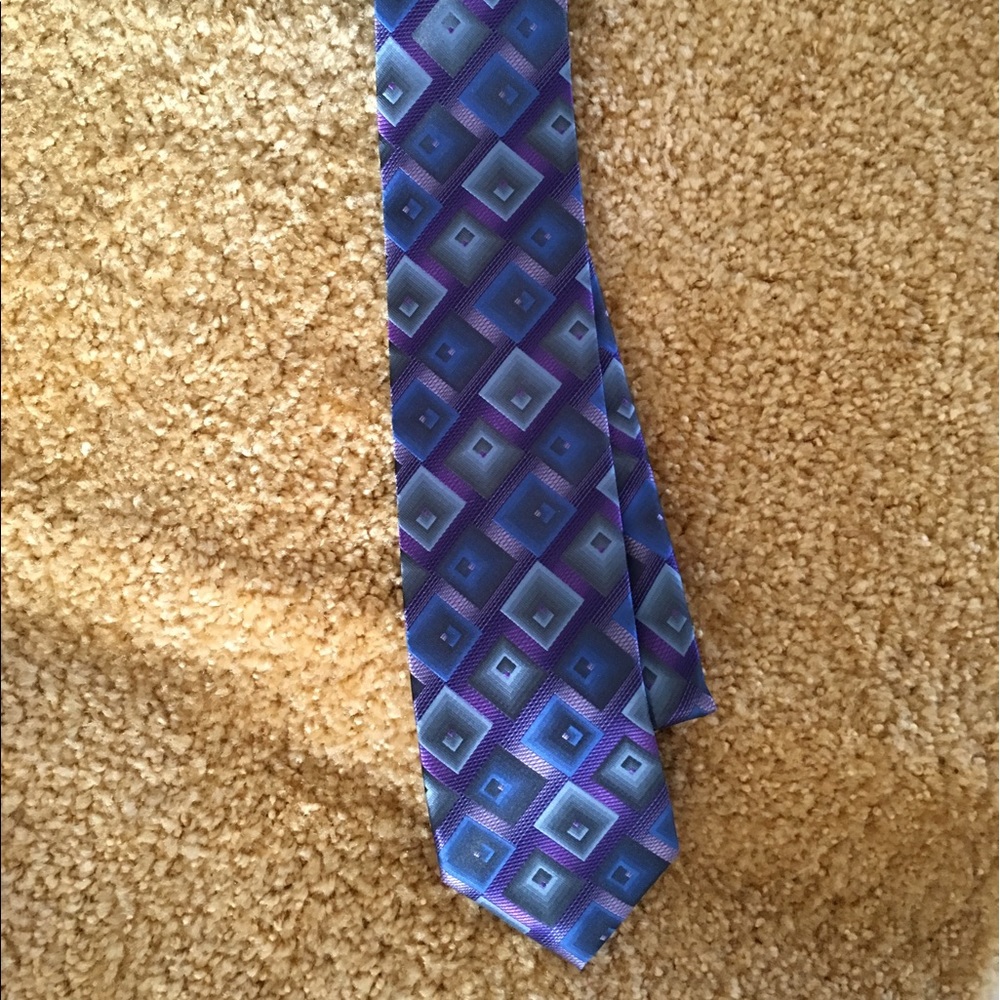 John Ashford Tie.  Blues and patterns.  New.