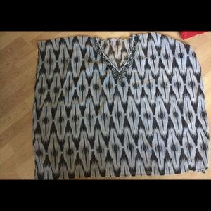 Beautiful black & white poncho by Chicos