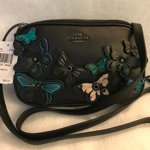 Coach , butterfly mini cross body purse