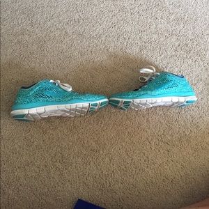 Women's Nike Free 5.0 running shoes size 7