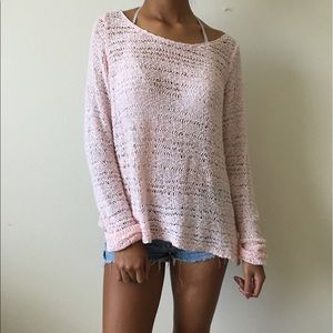 A light pink lace see through sweater
