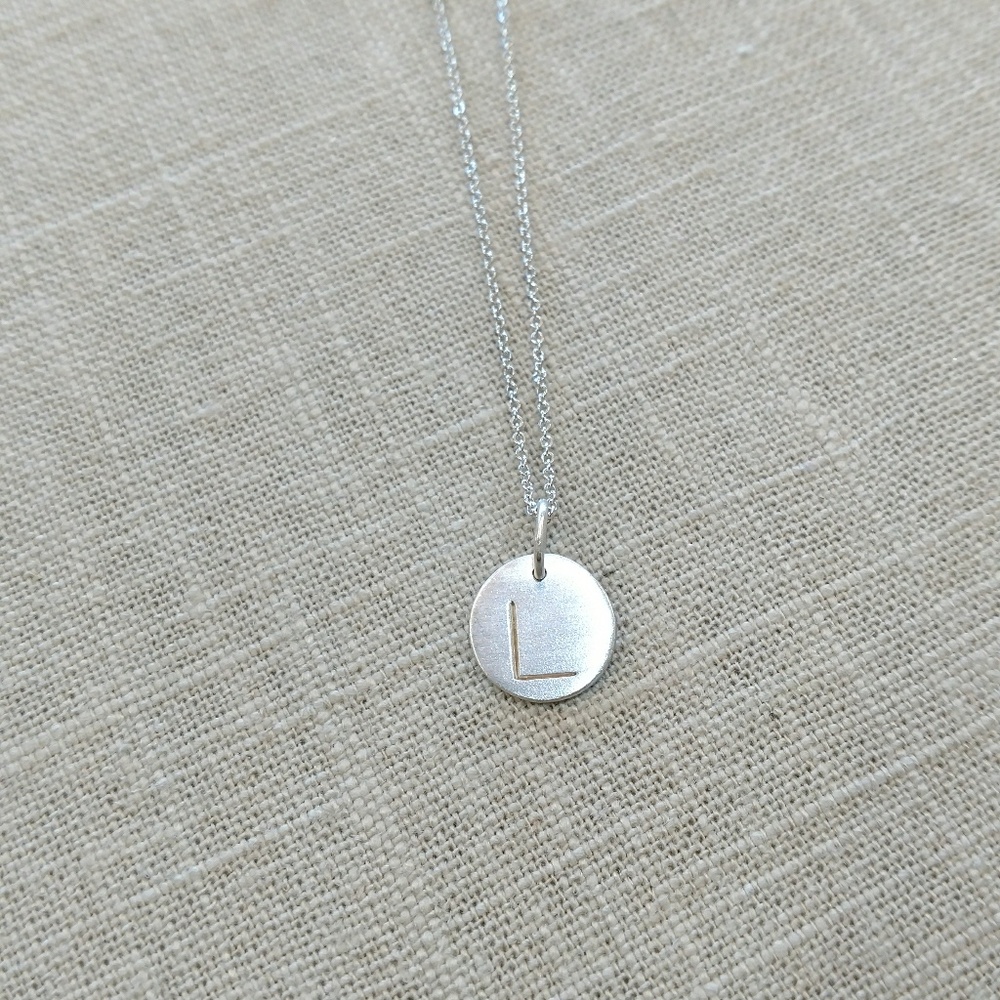 Sterling silver "L" disc pendant