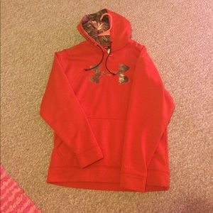 Men's Underarmour orange/camo sweatshirt.