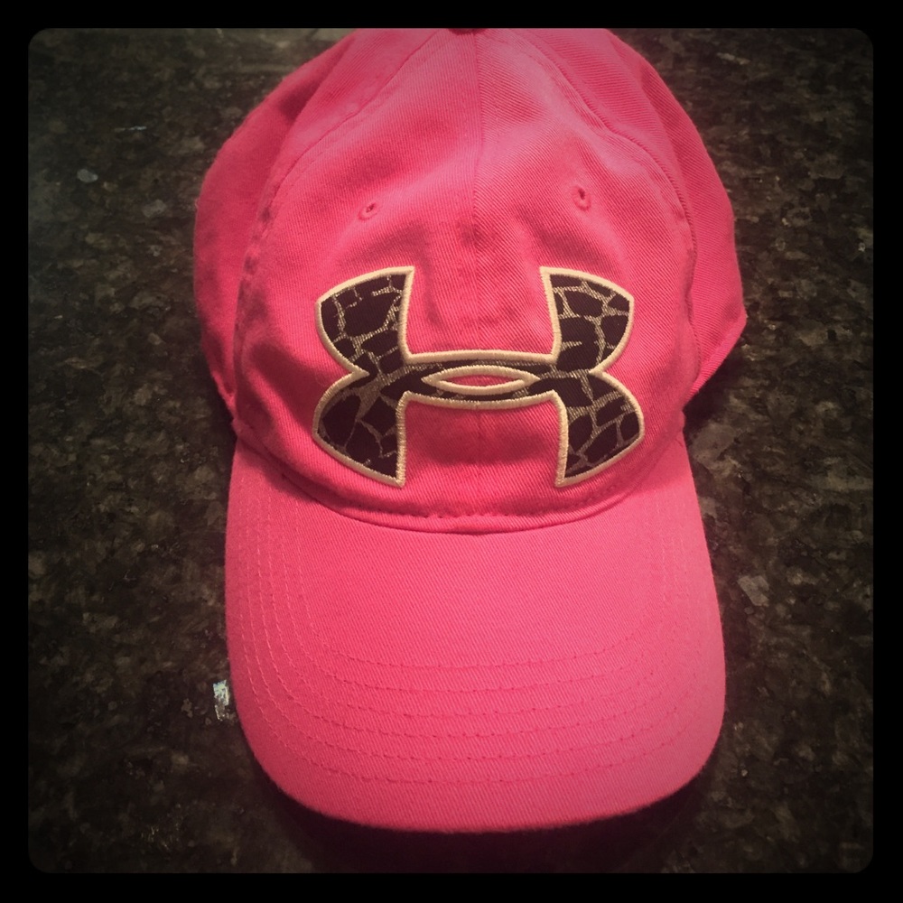A Under Armour Pink baseball cap