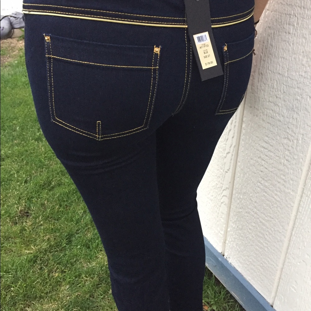 Designer jeans w/detailing around back and ankle