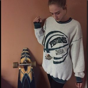 Vintage green and white Pistons crewneck.
