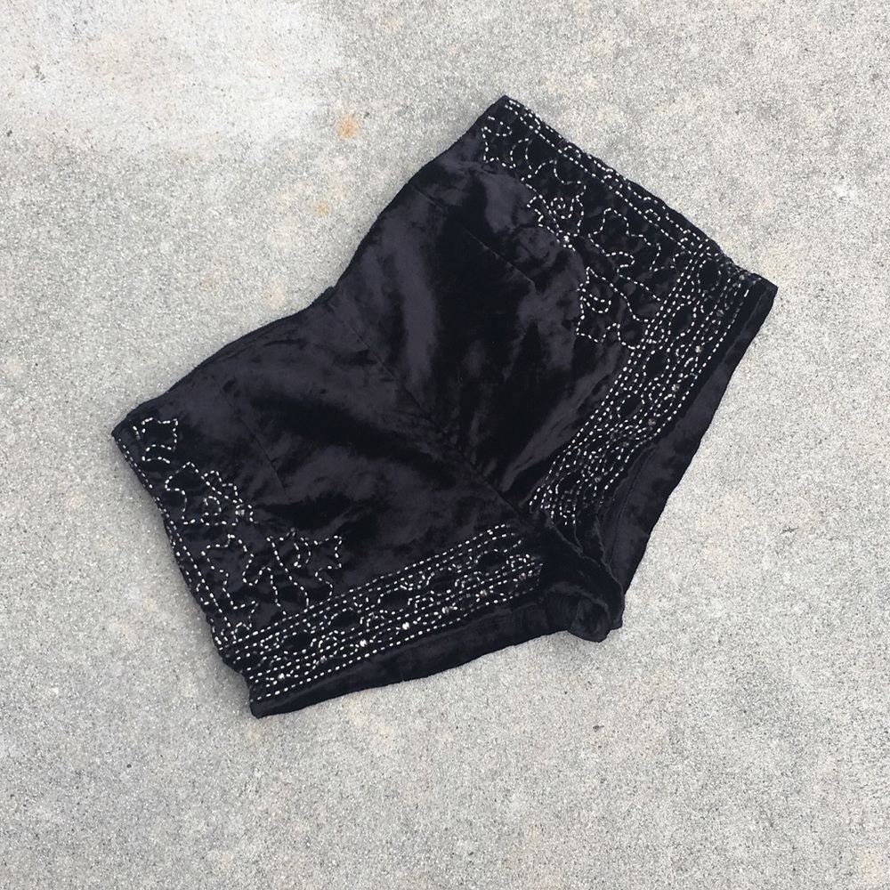 UO black velvet shorts with bead detail