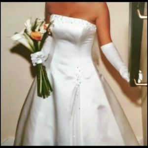 Certified Maggie Sottero wedding gown.