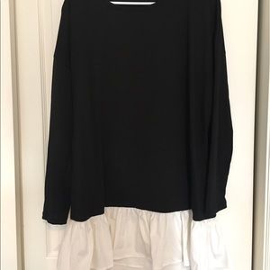 Boohoo.com black blouse with white ruffles