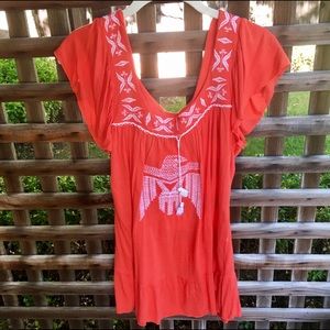 Rebel Yell orange flowy top with tassels