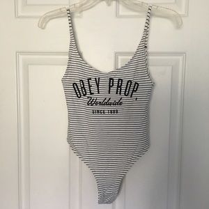 OBEY Low back body suit. Black and white stripes
