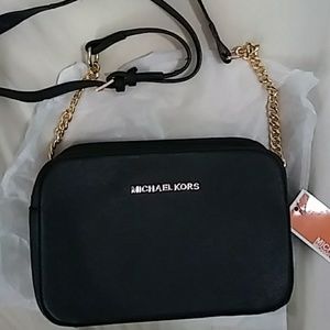 Michael Kors large clutch/shoulder bag .Black