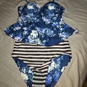 Floral and striped reversible swim suit.